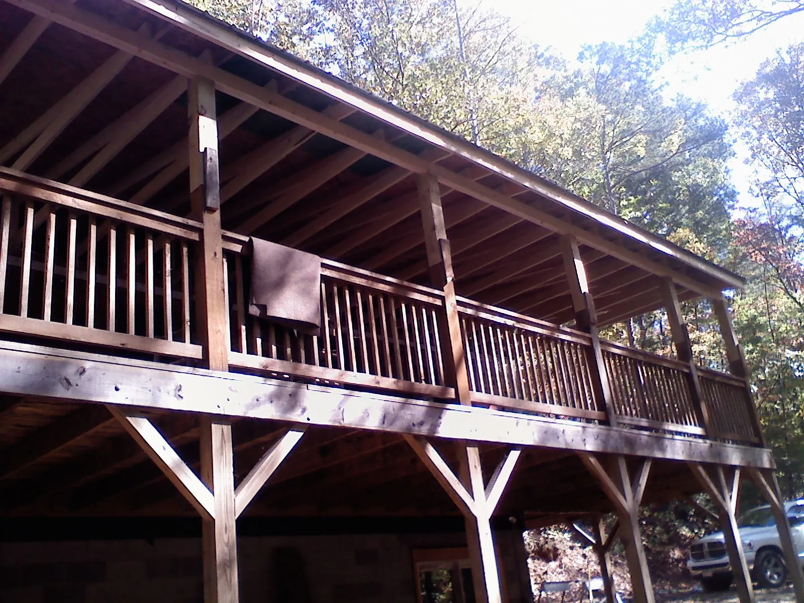 Timber framing under a new elevated porch and deck — Roof Leak Repair in Red Lodge by Roofing Brothers